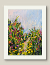 Load image into Gallery viewer, A vibrant painting featuring a sunlit field of wildflowers with a pathway, framed with a white mat. Abstract florals by Haleh Mahbod
